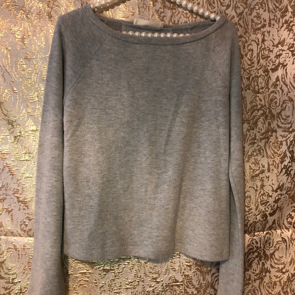 Open-back long sleeve top.
